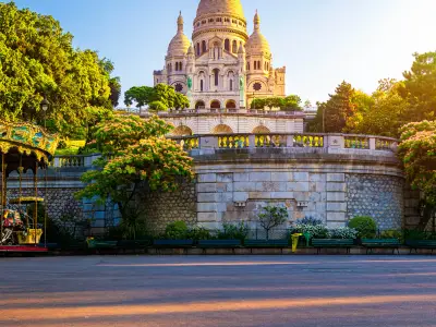 Basilica Sacre Coeur in Montmartre in Paris, France. The Basilica of the Sacred Heart (Sacre Coeur Basilica). Montmartre, Paris, France. Paris. Basilica Sacre-Coeur. On the hill Montmartre. Paris.